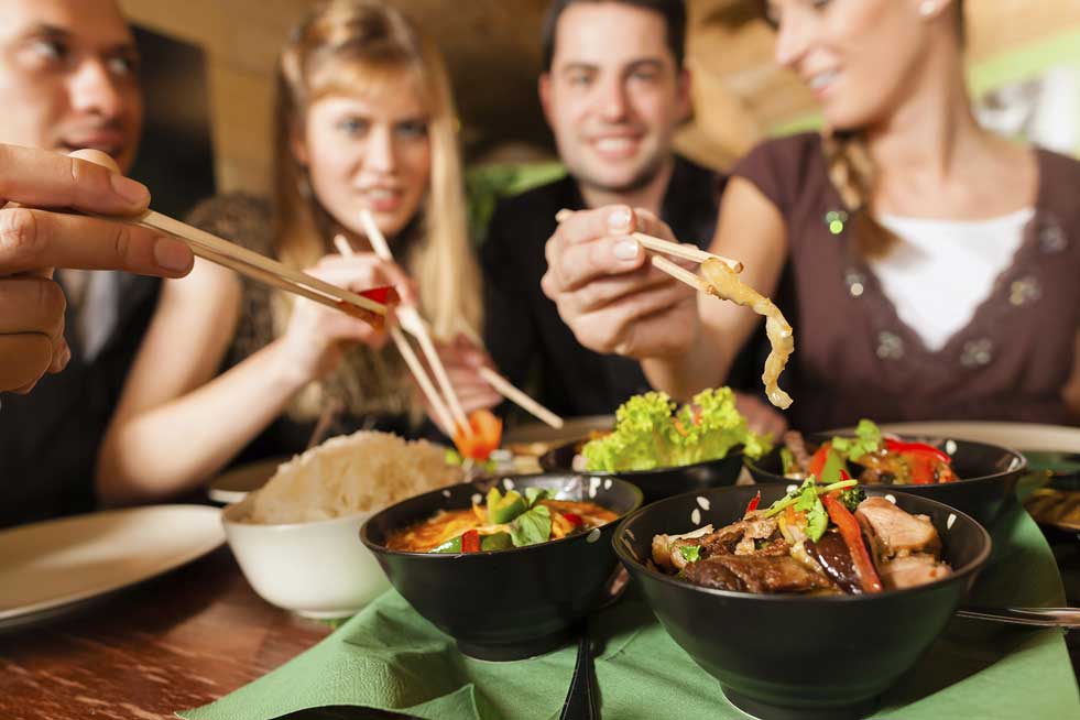 friends eating together at the restaurant 